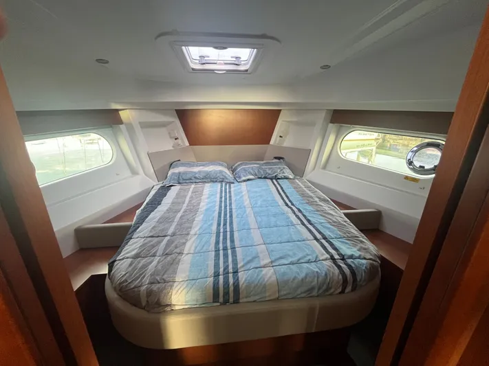Isabelle Yacht Photos Pics Interior of 2016 Beneteau Swift Trawler 30 with cozy bed.