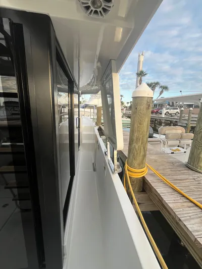 Isabelle Yacht Photos Pics Beneteau Swift Trawler 30, 2016, docked with clear side view.