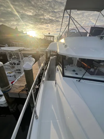 Isabelle Yacht Photos Pics Beneteau Swift Trawler 30, 2016, docked at sunset.