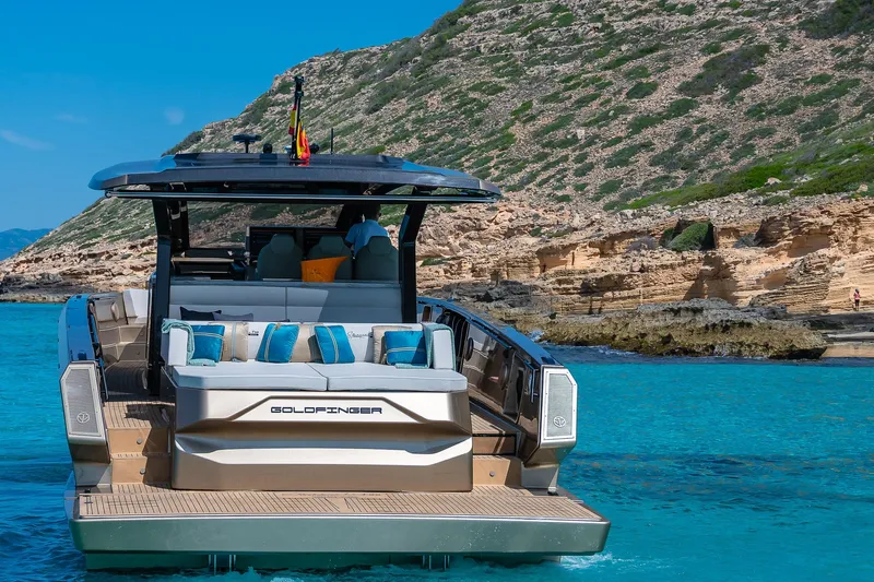  Yacht Photos Pics Luxury Tesoro GOLDFINGER T50 yacht by Armani, 2025, in scenic coastal waters.