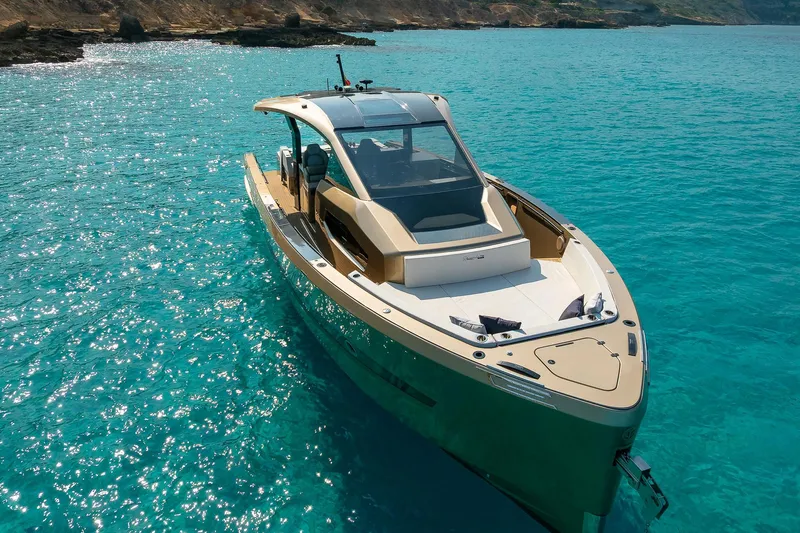  Yacht Photos Pics Luxury Tesoro GOLDFINGER T50 yacht by Armani, 2025, on turquoise waters.