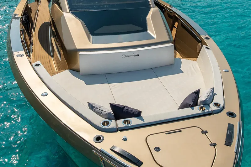  Yacht Photos Pics Luxury Tesoro GOLDFINGER T50 yacht by Armani, 2025, on turquoise water.