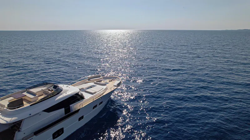 Monachus 70 Fly Yacht Photos Pics Luxury Monachus 70 Fly yacht cruising on open sea, 2026 model.