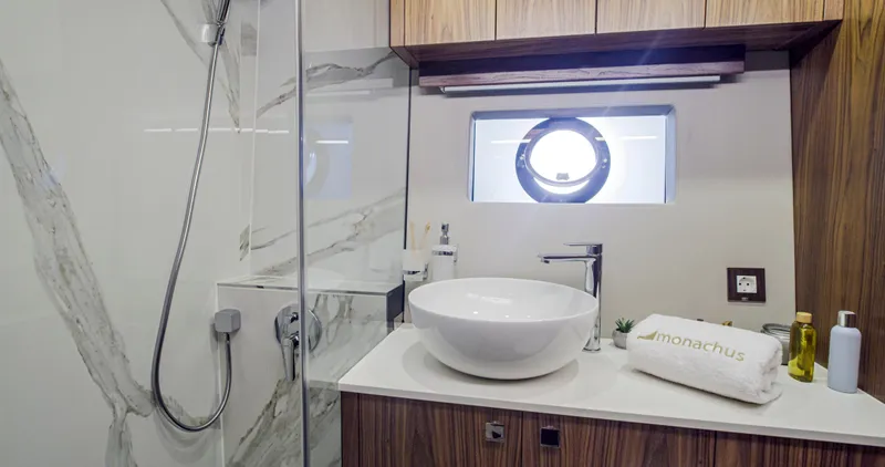 Monachus 70 Fly Yacht Photos Pics Luxurious bathroom on Monachus 70 Fly yacht, featuring modern fixtures and elegant design, 2026 model.