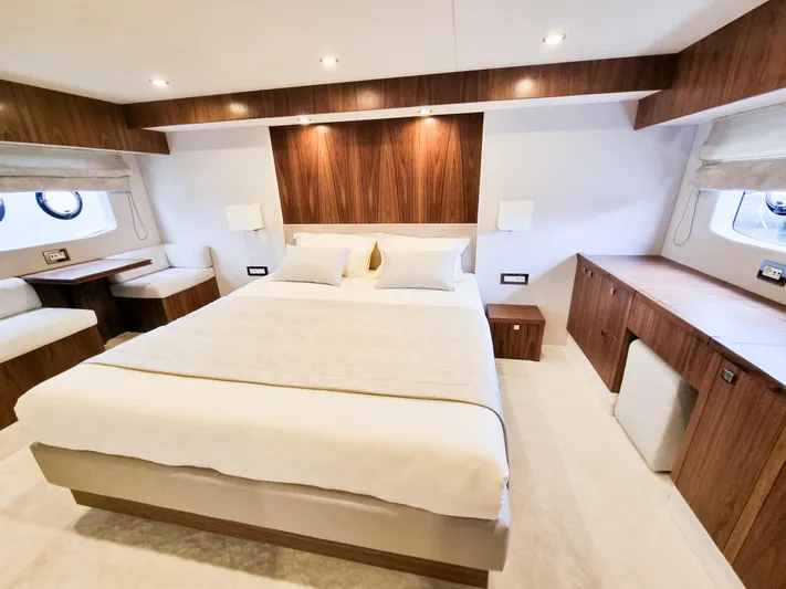 Monachus 70 Fly Yacht Photos Pics Luxurious bedroom interior of 2026 Monachus 70 Fly yacht with elegant wood finishes.