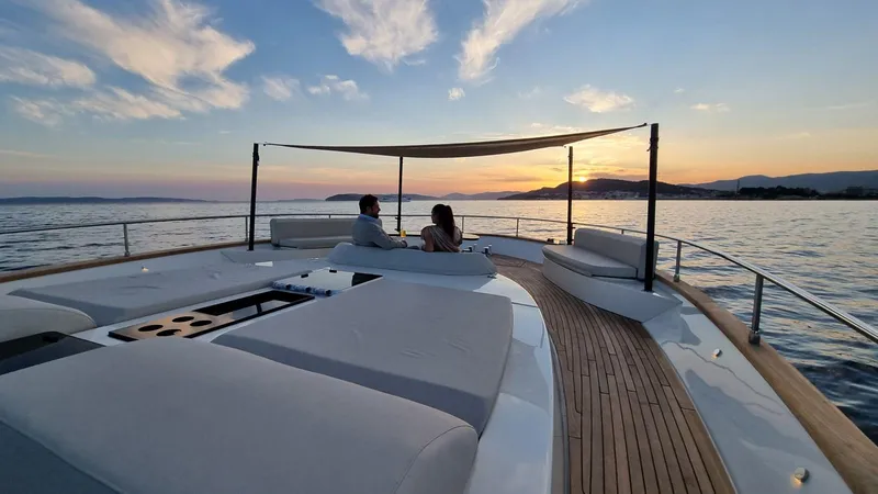 Monachus 70 Fly Yacht Photos Pics Luxury Monachus 70 Fly yacht at sunset, 2026 model, with elegant deck seating.