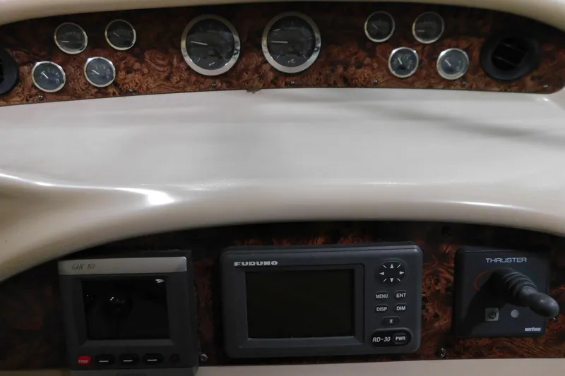  Yacht Photos Pics Control panel of a 1998 Sea Ray 540 Sundancer with gauges and navigation equipment.