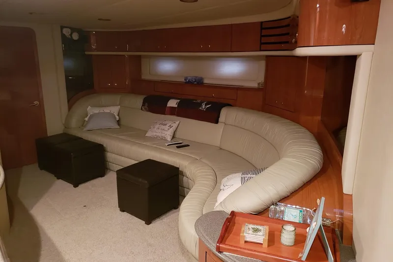  Yacht Photos Pics Luxurious interior of 1998 Sea Ray 540 Sundancer yacht with curved leather seating.