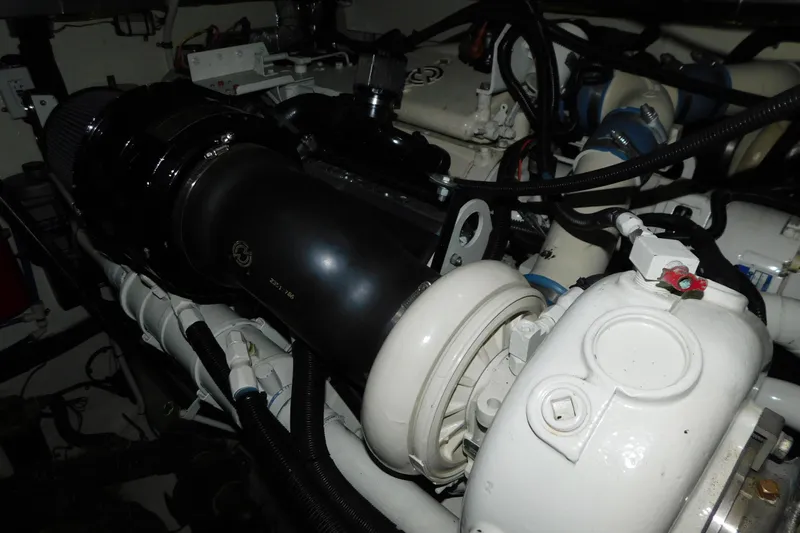  Yacht Photos Pics Engine compartment of a 1998 Sea Ray 540 Sundancer yacht, showcasing mechanical components.