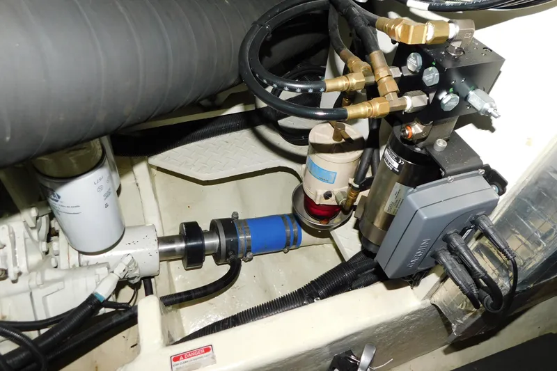  Yacht Photos Pics Engine compartment of 1998 Sea Ray 540 Sundancer with hydraulic and electrical components.