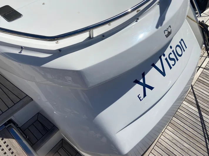  Yacht Photos Pics Sleek 2016 Princess V48 Open yacht with "Vision" branding on the stern.