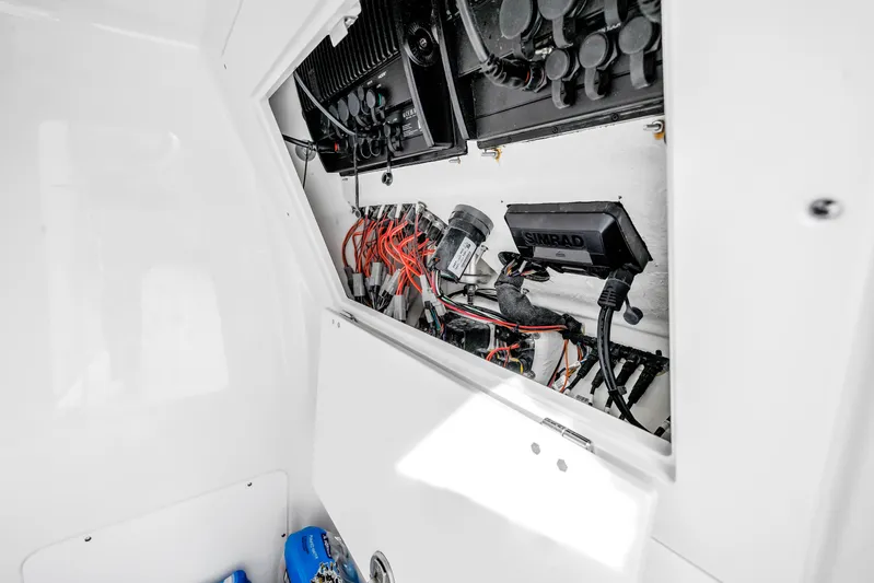  Yacht Photos Pics Electrical panel inside 2025 Caymas 28 HB boat, featuring Simrad equipment and wiring.