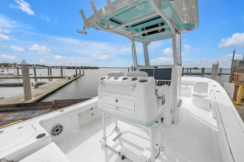  Yacht Photos Pics 2025 Caymas 28 HB boat at marina, featuring modern helm and spacious deck.