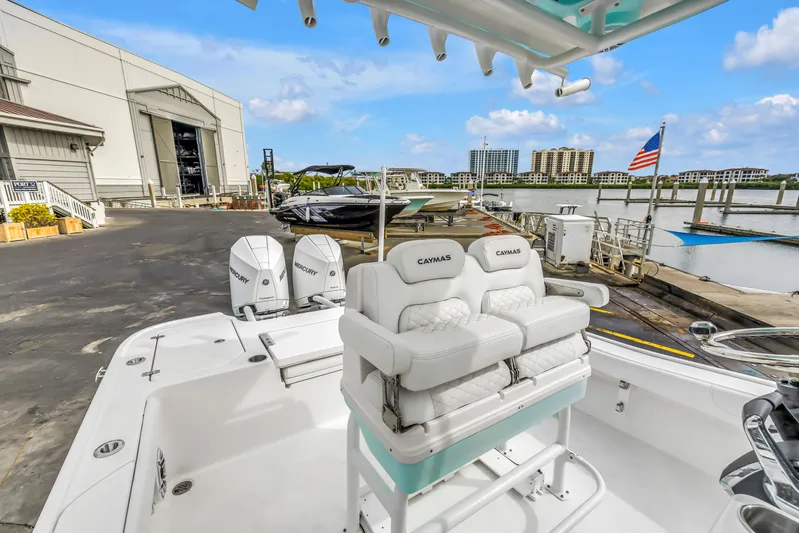  Yacht Photos Pics 2025 Caymas 28 HB boat docked at marina with dual Mercury engines.