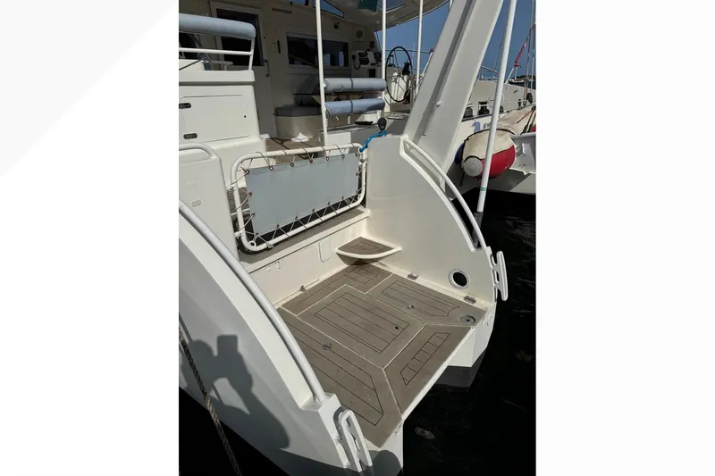 Alita Too Yacht Photos Pics Custom COAST 50 yacht stern view, featuring a spacious deck area, 2018 model.