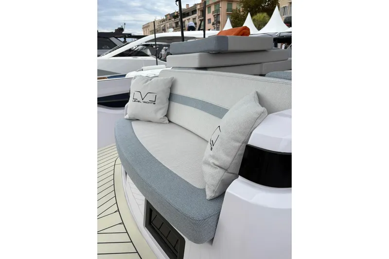  Yacht Photos Pics Luxurious seating on 2026 Level Yachts 43 STS, featuring elegant cushions and modern design.