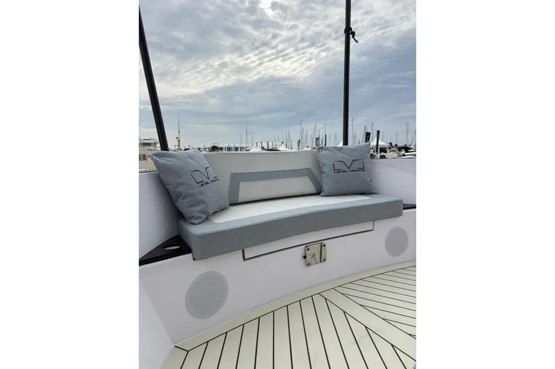  Yacht Photos Pics Luxurious seating on 2026 Level Yachts 43 STS, featuring elegant cushions and sleek design.