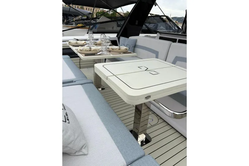  Yacht Photos Pics Luxurious 2026 Level Yachts 43 STS interior with elegant dining setup and modern design.