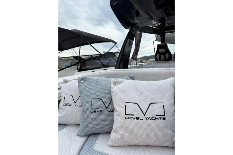  Yacht Photos Pics Luxury Level Yachts 43 STS 2026 with branded cushions on deck.