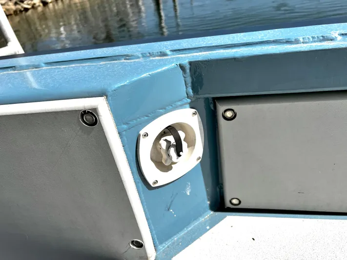 Acb Yacht Photos Pics Blue and gray boat interior detail with a socket, ACB 30, 2003 model.
