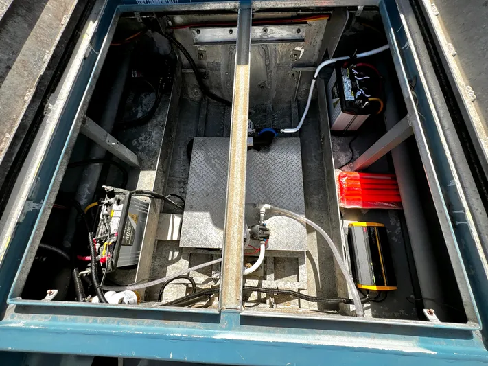 Acb Yacht Photos Pics Interior view of ACB 30 model 2003, showcasing battery and electrical components.