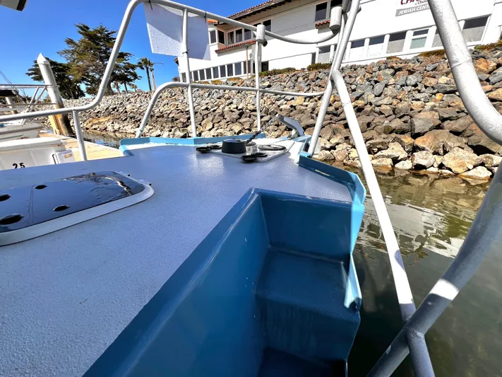 Acb Yacht Photos Pics ACB 30 boat docked near rocky shoreline, 2003 model.