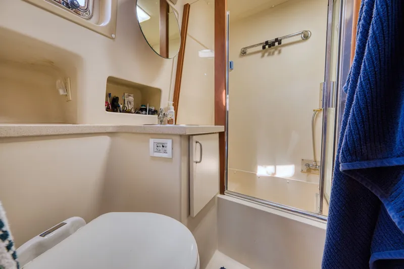 #r Dream Yacht Photos Pics Bathroom in 2005 Mainship 400 Trawler with shower and toilet.