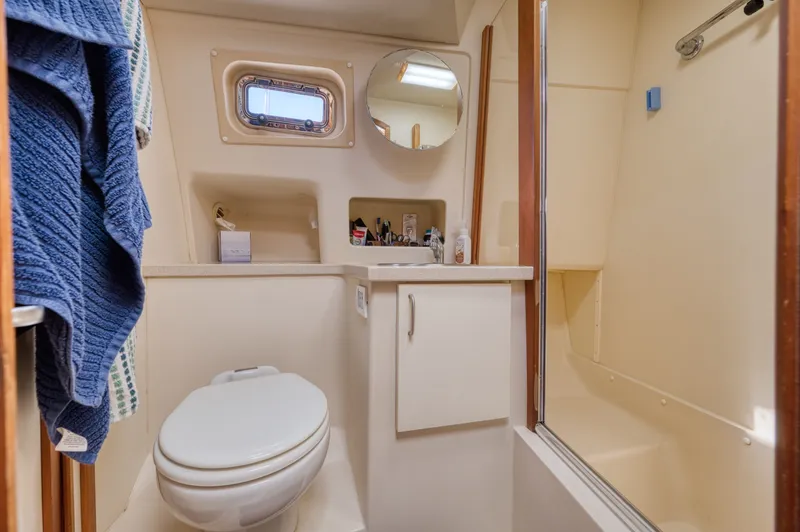 #r Dream Yacht Photos Pics Bathroom in 2005 Mainship 400 Trawler with shower and toilet.