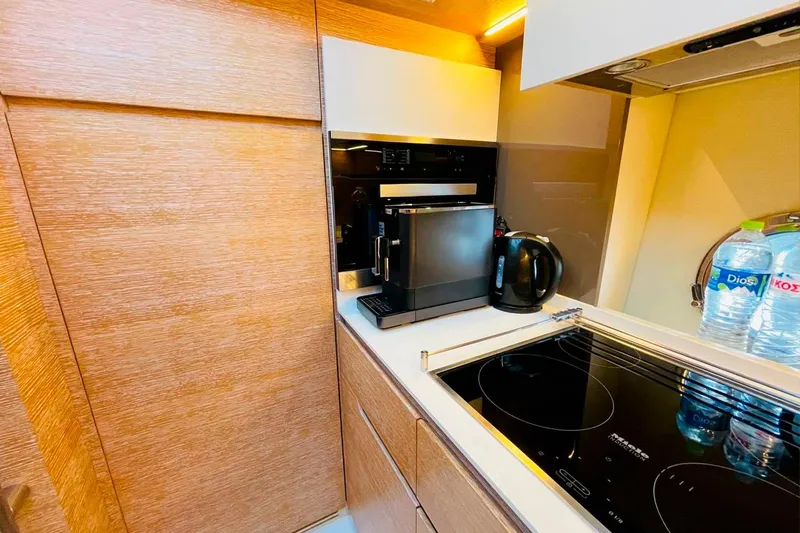  Yacht Photos Pics Modern kitchen in 2016 Azimut 50 yacht with appliances and sleek design.