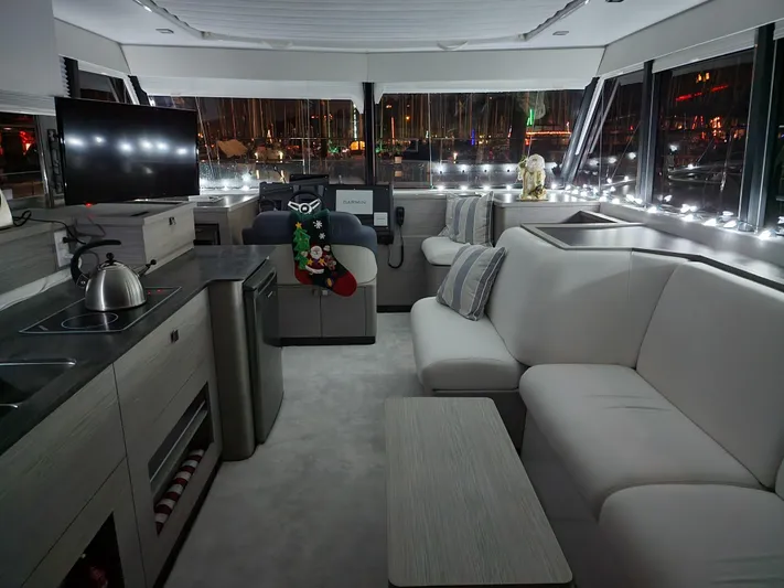 Emily Yacht Photos Pics Luxurious interior of 2022 Fountaine Pajot MY4.S yacht, featuring modern decor and ambient lighting.
