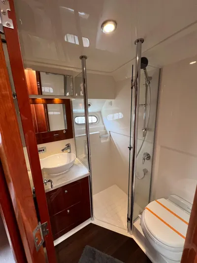 New Listing Yacht Photos Pics Luxurious bathroom in 2016 Riviera 45 Open Flybridge yacht with modern fixtures.