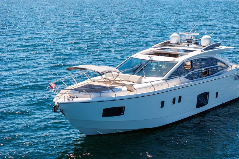 Blue Daksa Yacht Photos Pics Luxurious 2013 Absolute 64 yacht cruising on open blue waters.