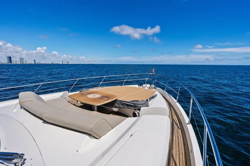 Blue Daksa Yacht Photos Pics Luxury Absolute 64 yacht cruising on open sea, clear blue sky, 2013 model.
