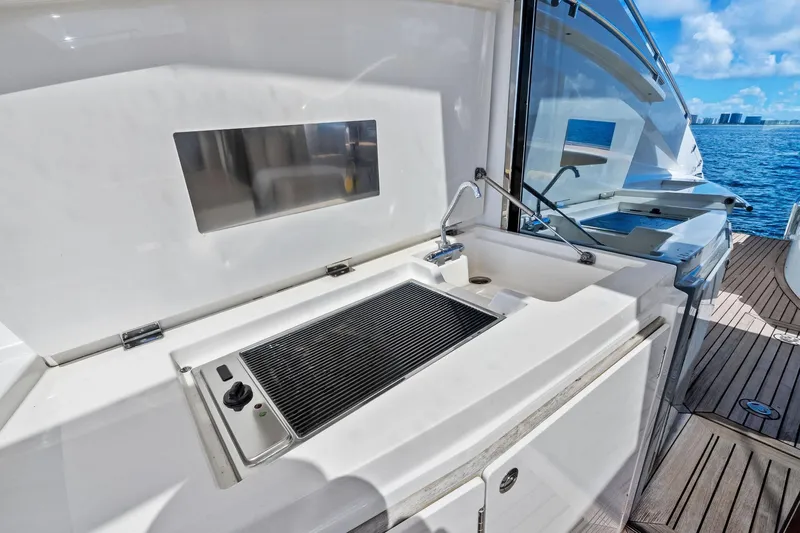 Blue Daksa Yacht Photos Pics Outdoor kitchen on 2013 Absolute 64 yacht with grill and sink, ocean view.