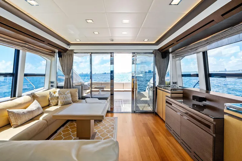 Blue Daksa Yacht Photos Pics Luxurious interior of 2013 Absolute 64 yacht with ocean view and elegant furnishings.