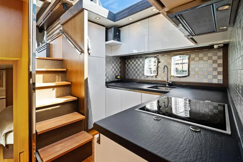 Blue Daksa Yacht Photos Pics Luxurious kitchen interior of 2013 Absolute 64 yacht with modern design and sleek finishes.