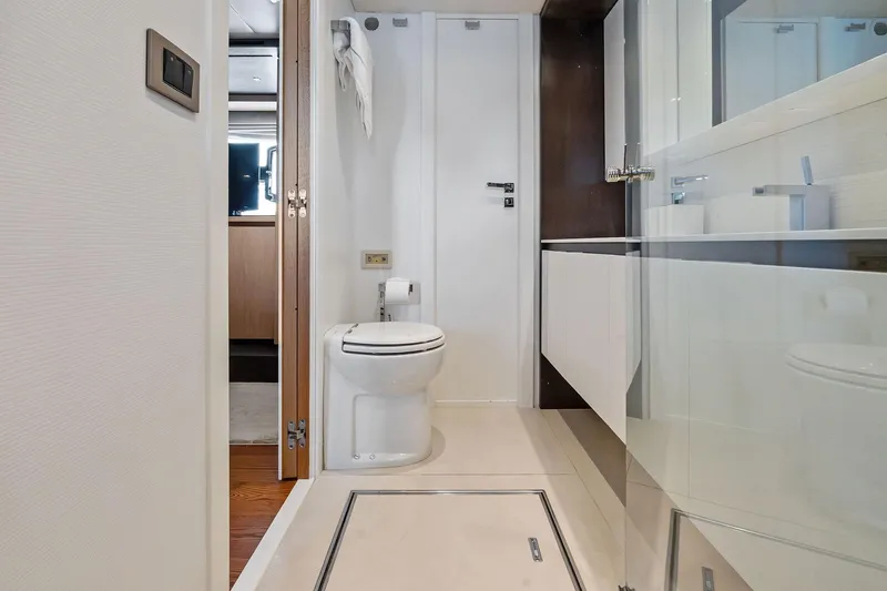 Blue Daksa Yacht Photos Pics Luxurious bathroom on a 2013 Absolute 64 yacht, featuring modern fixtures and sleek design.