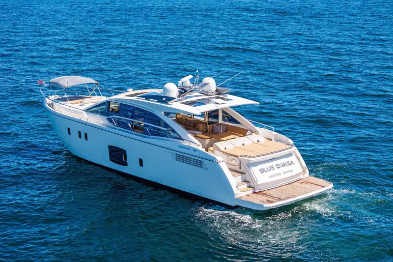 Blue Daksa Yacht Photos Pics Luxury 2013 Absolute 64 yacht cruising on open blue sea.