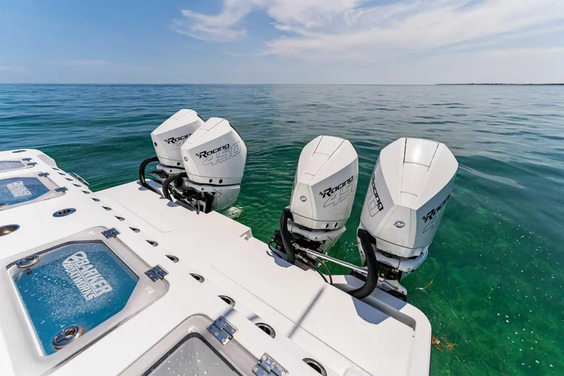  Yacht Photos Pics 2023 Barker Boatworks 40 HPC with triple outboard engines on the water.