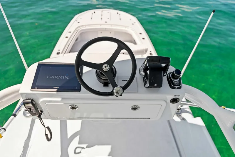  Yacht Photos Pics 2023 Barker Boatworks 40 HPC helm with Garmin navigation system.