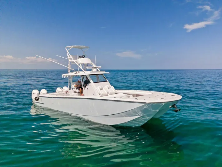  Yacht Photos Pics 2023 Barker Boatworks 40 HPC on clear blue ocean.