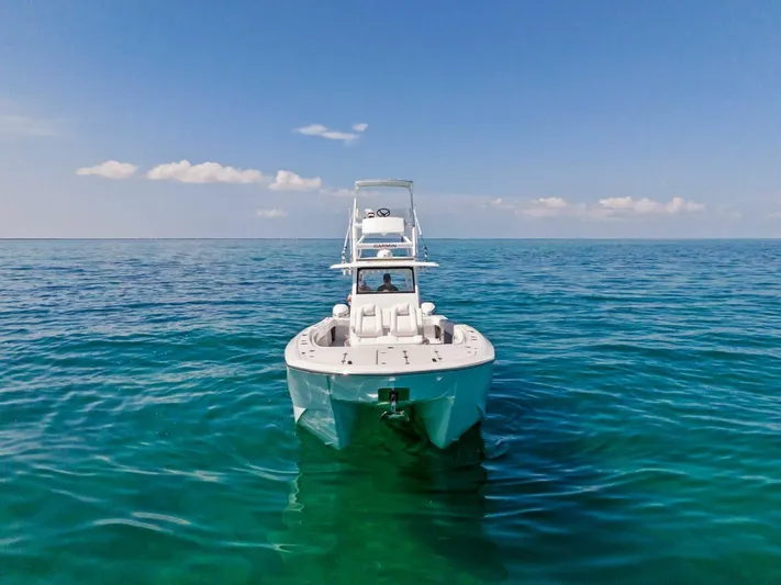  Yacht Photos Pics 2023 Barker Boatworks 40 HPC on clear blue ocean water.
