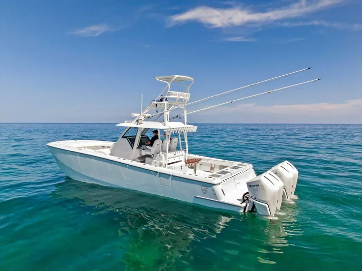  Yacht Photos Pics 2023 Barker Boatworks 40 HPC on clear blue ocean water.