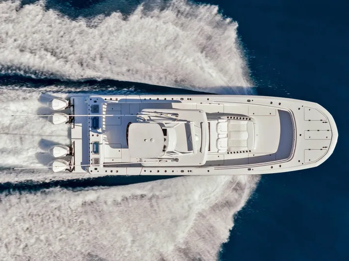  Yacht Photos Pics 2023 Barker Boatworks 40 HPC speeding on water, aerial view.