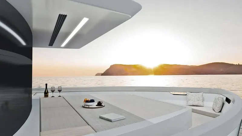  Yacht Photos Pics Luxurious 2026 Ladenstein L48 MIAMI yacht deck at sunset with elegant seating and ocean view.