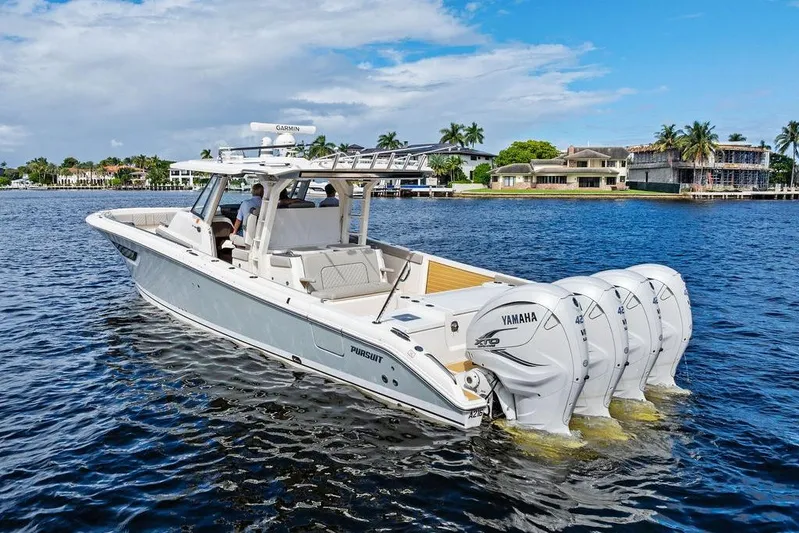 No Vacancy Yacht Photos Pics 2022 Pursuit S 428 Sport boat with Yamaha engines on a scenic waterfront.