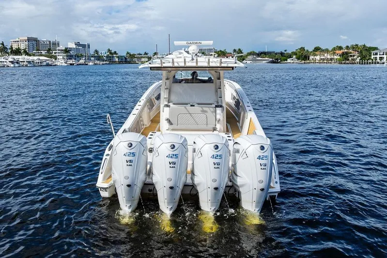 No Vacancy Yacht Photos Pics 2022 Pursuit S 428 Sport boat with four Yamaha 425 V8 engines on the water.