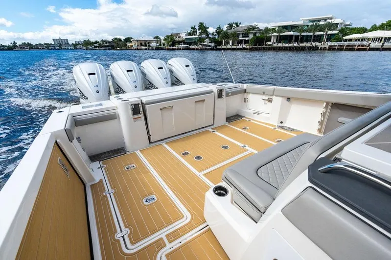 No Vacancy Yacht Photos Pics 2022 Pursuit S 428 Sport boat with spacious deck and four powerful engines.