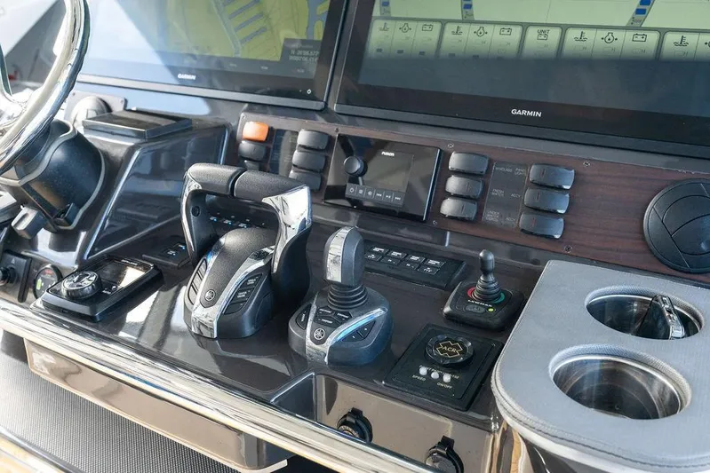 No Vacancy Yacht Photos Pics Control panel of 2022 Pursuit S 428 Sport boat with advanced navigation and steering systems.