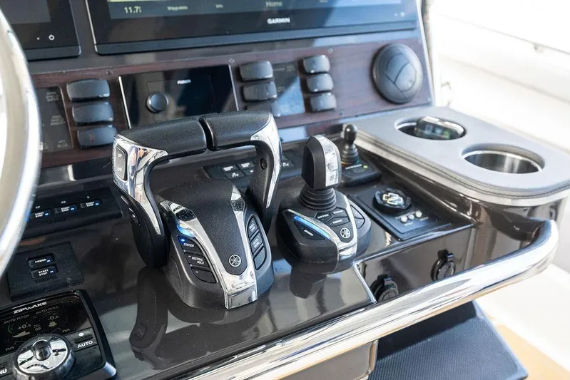 No Vacancy Yacht Photos Pics Control panel of 2022 Pursuit S 428 Sport boat with advanced navigation features.